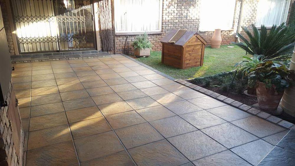Easy Edge SA Patio installation beside garden